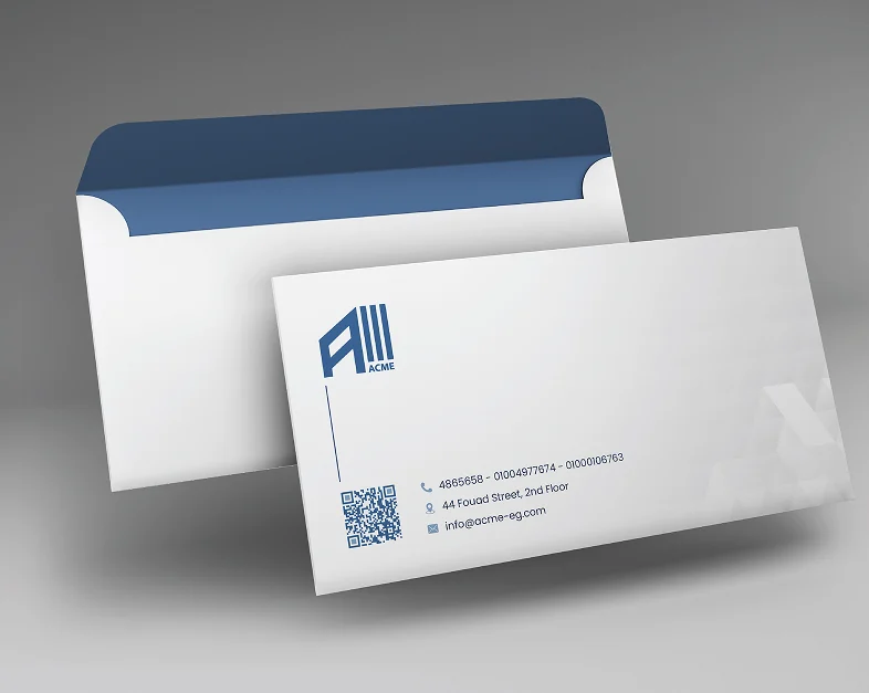 An ACME envelope and business card with its contact details