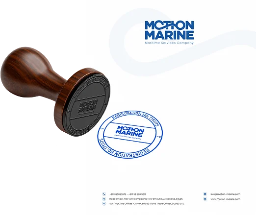 The Motion Marine letterhead beside a wooden company stamp and its blue imprint