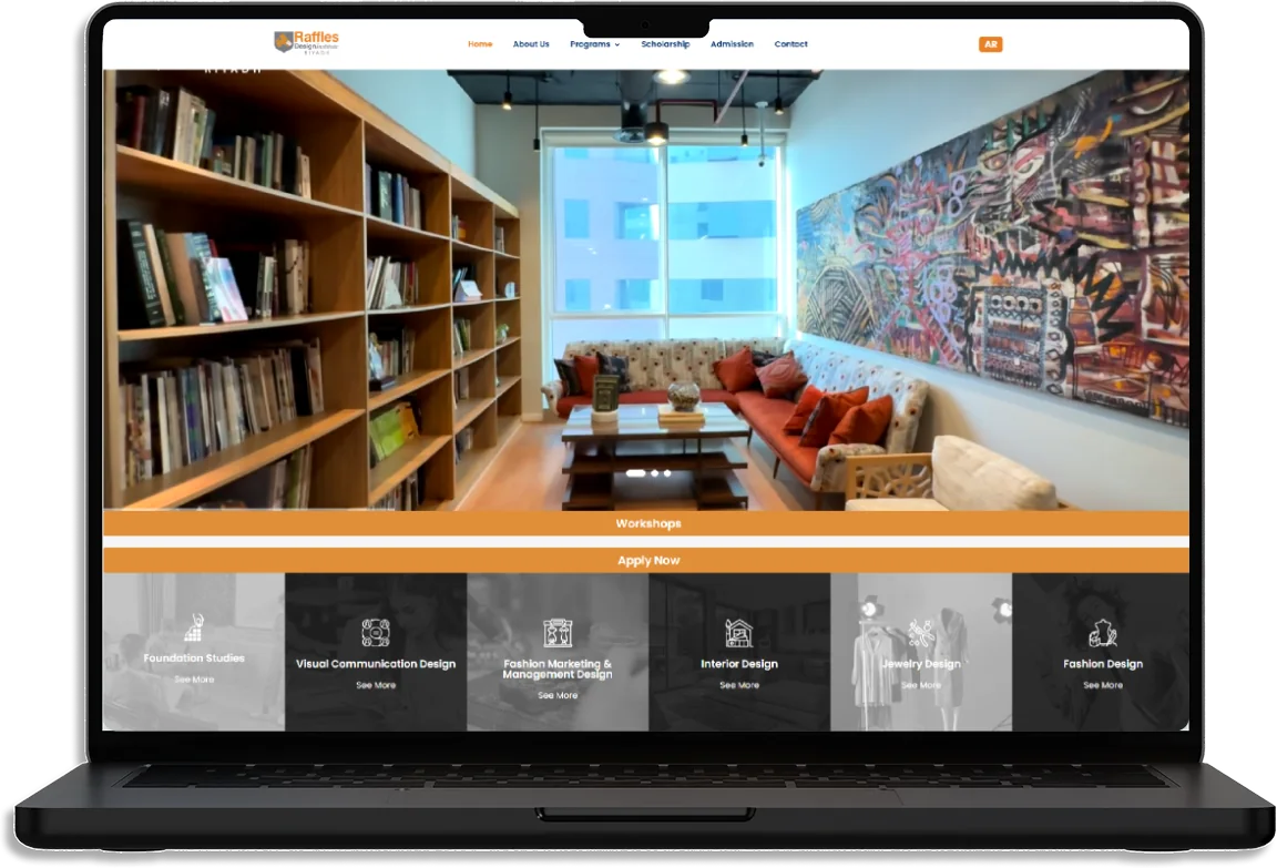 The Raffles Design Institute Riyadh website on a laptop: the campus library lounge, Workshops and Apply Now, and the six design programs