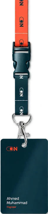 A Switch On staff badge on an orange lanyard