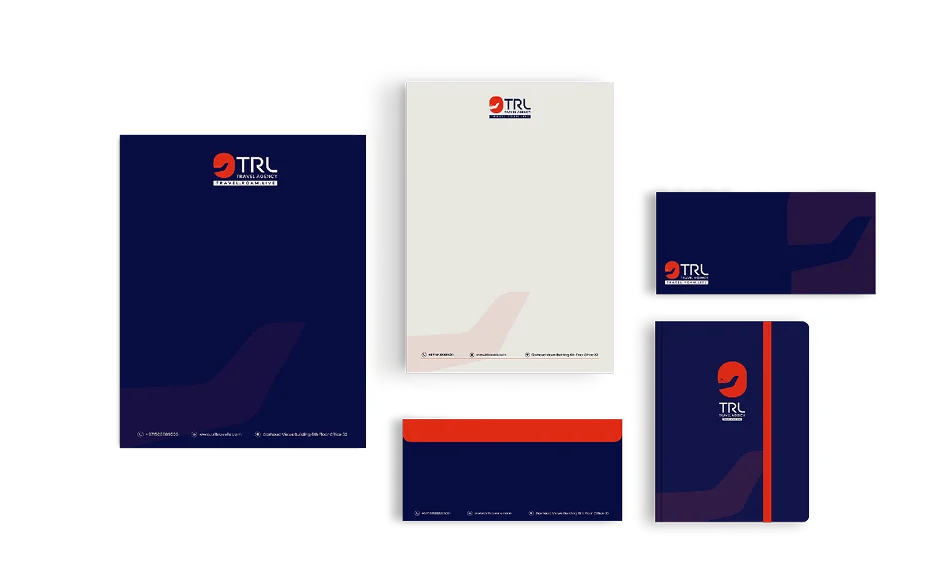 TRL stationery in navy and white: letterheads, an envelope, a compliment slip and a notebook